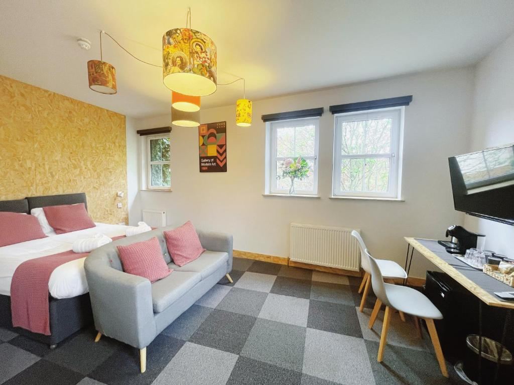 On The Walk room with a double bed, sofa and tea and coffee facilities