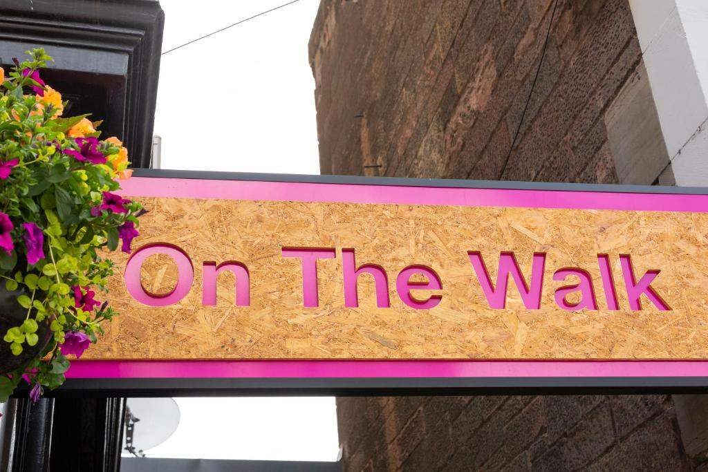 On The Walk hotel entrance sign on Albert Place, Edinburgh
